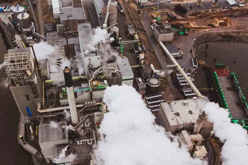 Image of factories for an article titled “Online Guide to Industrial Symbiosis”